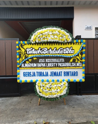 Papan Bunga Duka di Damai Baru